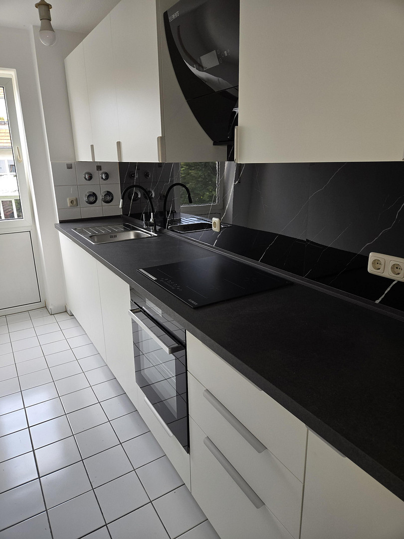 Tolle 2-Zimmer-Wohnung mit neuer Einbauküche, renov. Bad und Fußbodenheizung