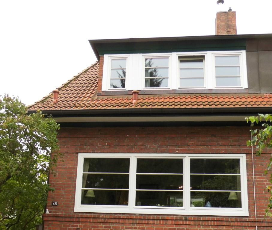 Klassischer Rotklinker mit alten Stilelmenten - DHH in Hamburgs Norden