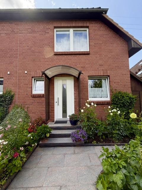 Gepflegte Doppelhaushälfte mit Privatgarten und Terrasse in begehrter Familienlage Sasel