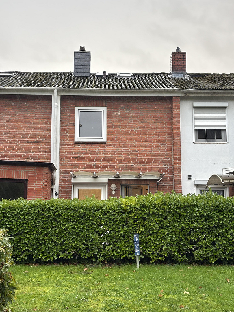 Modernisiertes Reihenhaus mit Wärmepumpe, Energieklasse B und Garage, ohne Courtage